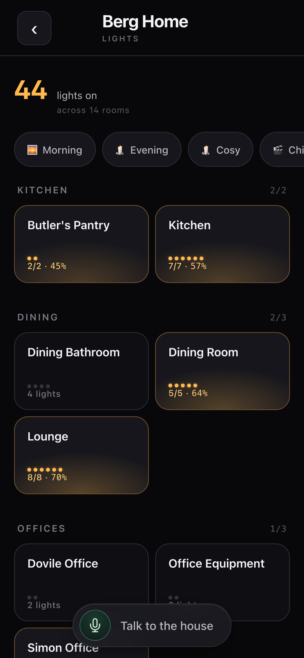 Berg Home control panel lights view on iPhone: 44 lights on across 14 rooms with room cards and warm amber glows